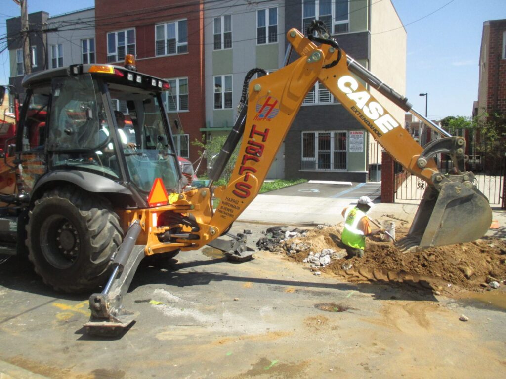 Water Main Break Gushes Through Sidewalk in Jamaica Queens