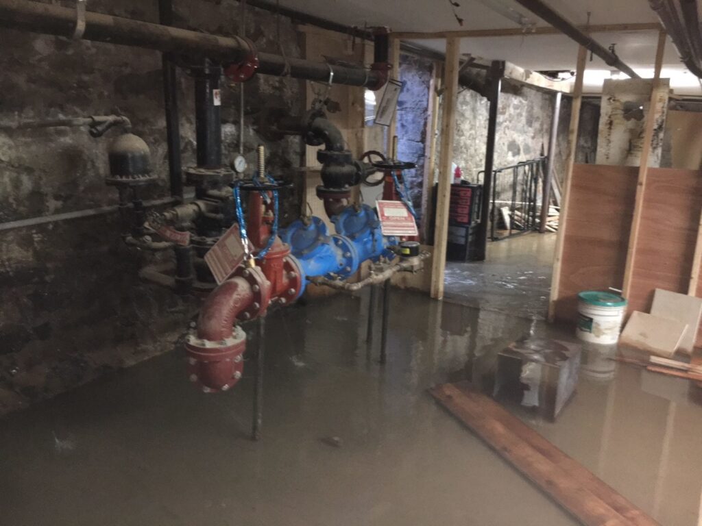 Fixing a Water Main Leak Flooding Basement