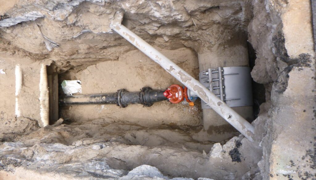 What Regulates the Flow of Water in a Distribution System?