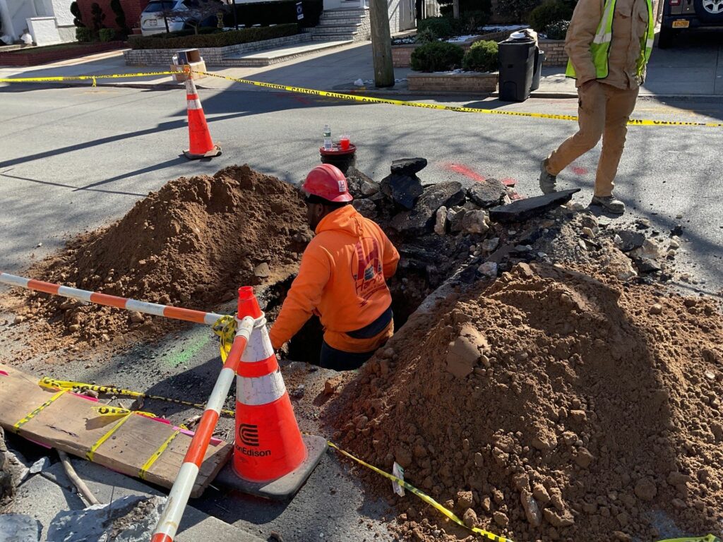 Emergency water main repair crew near Central Park