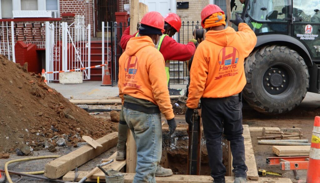 Licensed contractors completing water main installation Queens, NY