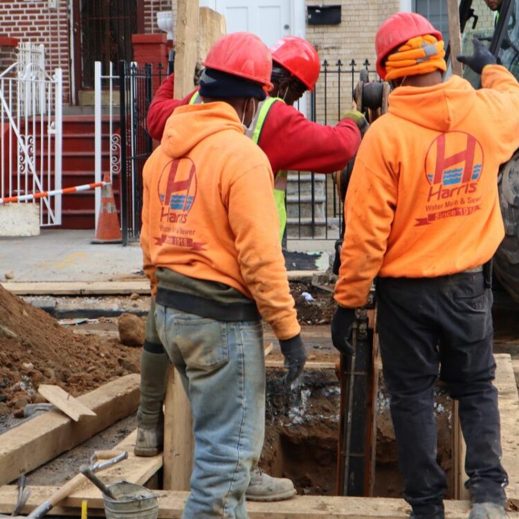 Licensed contractors completing water main installation Queens, NY