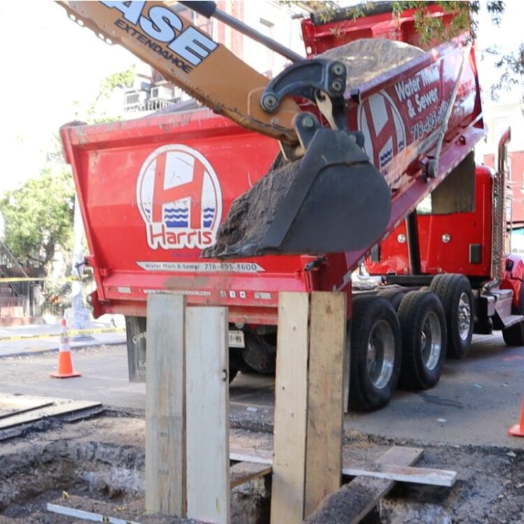 Water main installation Manhattan NY street excavation project